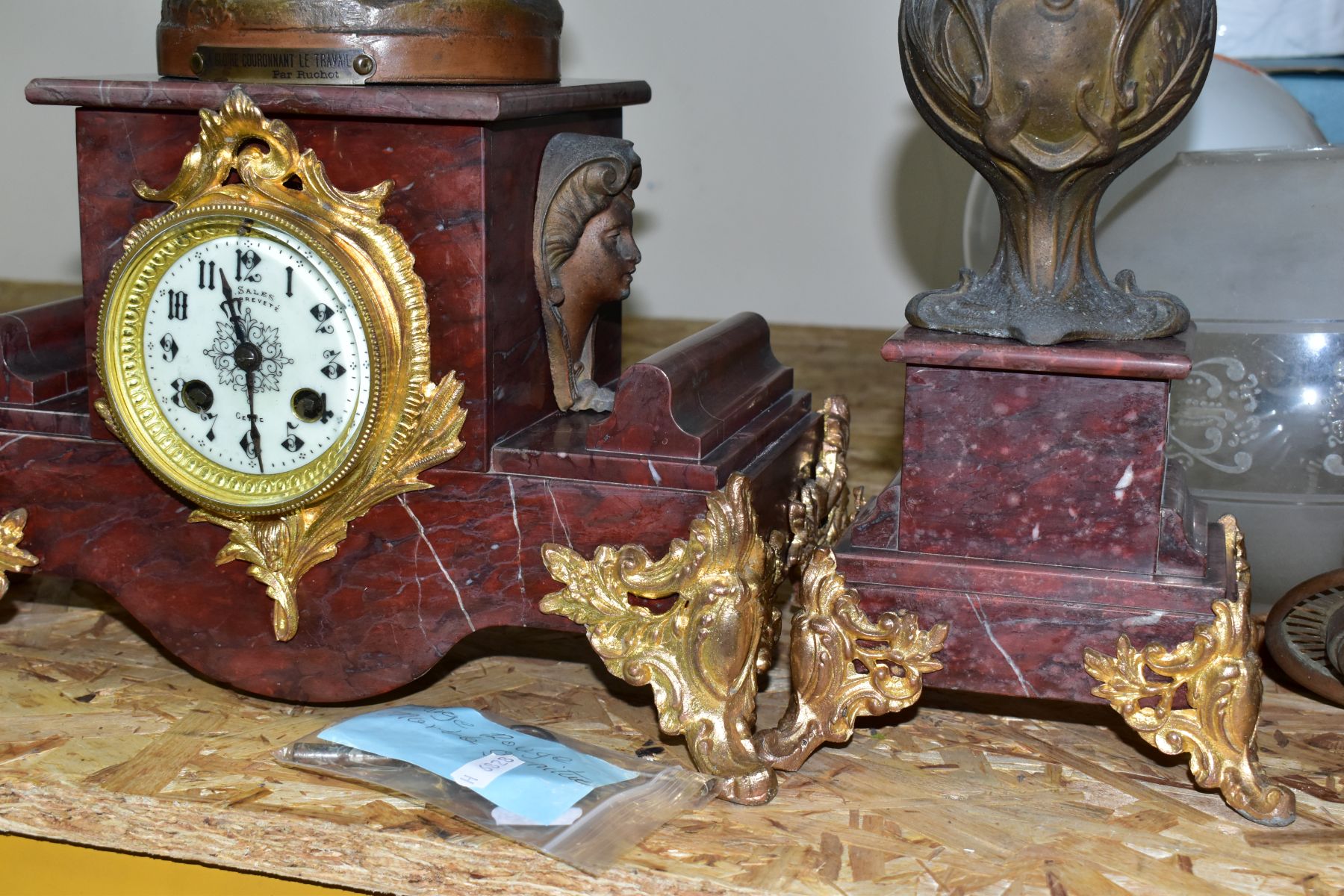 AN EARLY 20TH CENTURY BRONZED SPELTER AND ROUGE MARBLE CLOCK GARNITURE, the clock with figural - Image 2 of 10