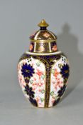 A ROYAL CROWN DERBY SMALL COVERED VASE, in the Imari 1128 pattern, date mark for 1906, red printed