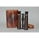 A PAIR OF 14X MAGNIFICATION BINOCULARS BY LLOYD OPTICIAN OF BOSTON, the leather to one barrel has