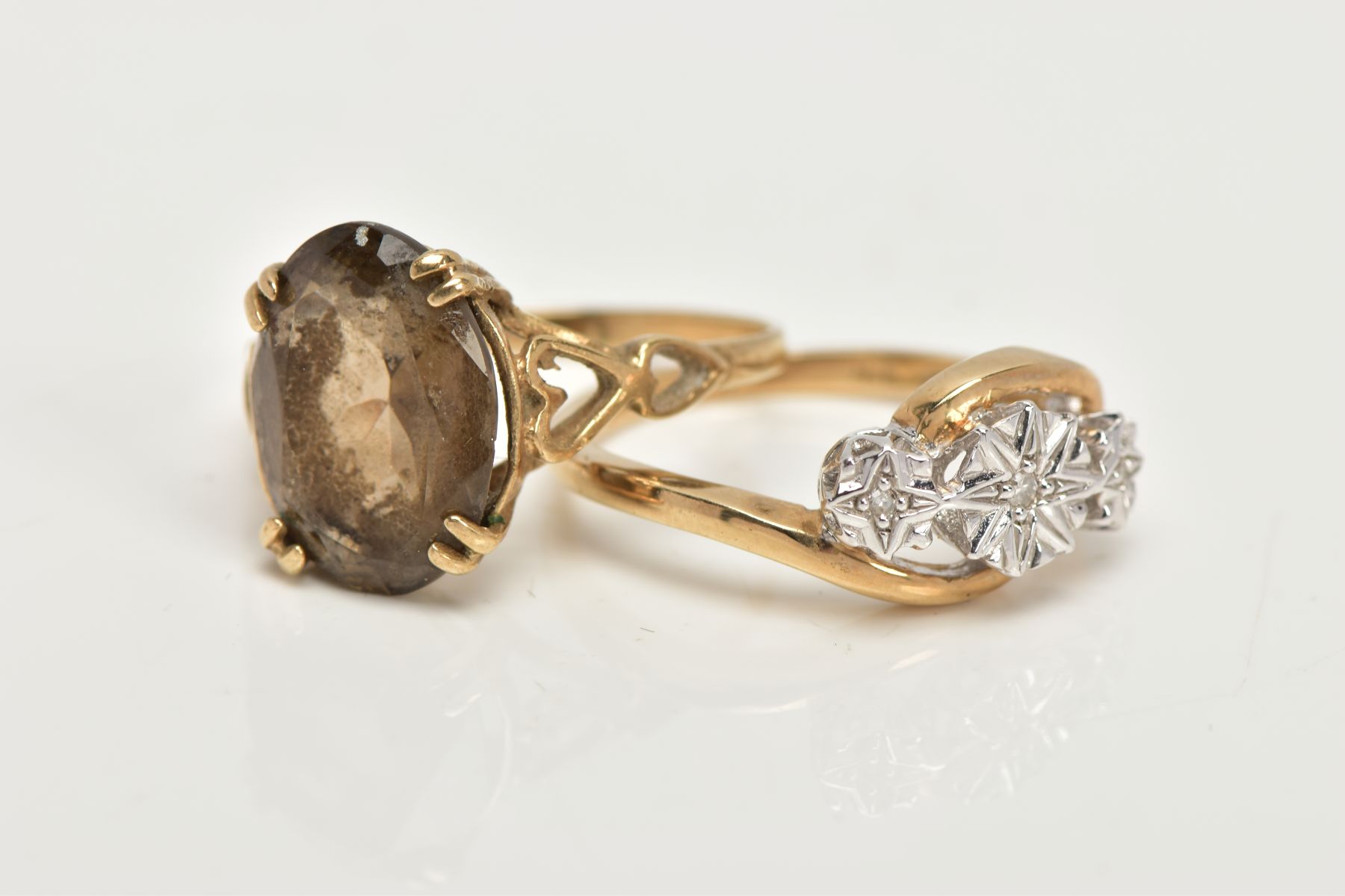 TWO 9CT GOLD RINGS, an oval cut stone assessed as Smokey quartz, prong set in a yellow gold, leading - Image 3 of 4