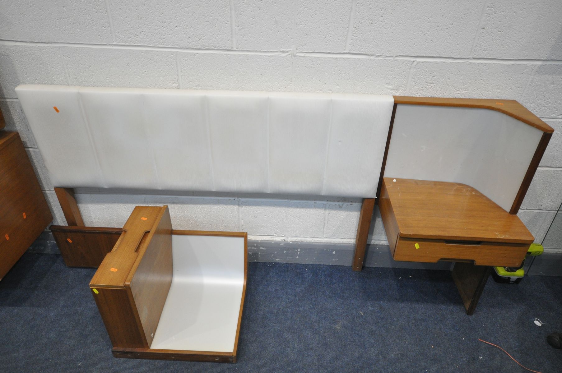 A UNIFLEX FIVE PIECE TEAK DRESSING TABLE, with a plywood back enclosing triple mirrors and seven - Image 6 of 7