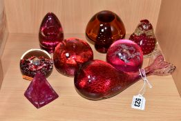 EIGHT MODERN GLASS PAPERWEIGHTS, PRIMARILY CRANBERRY AND RUBY IN COLOUR, including a Wedgwood whale,
