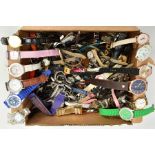 A BOX OF ASSORTED LADIES, GENTS AND CHILDRENS FASHION WRISTWATCHES, used conditions, mostly quartz