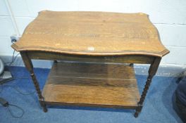 A 20TH CENTURY OAK RECTANGULAR BARLEY TWIST CENTRE TABLE, with wavy edge and canted corners,