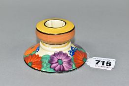 A CLARICE CLIFF FOR WILKINSONS POTTERY GAY DAY PATTERN CANDLESTICK, produced as part of the