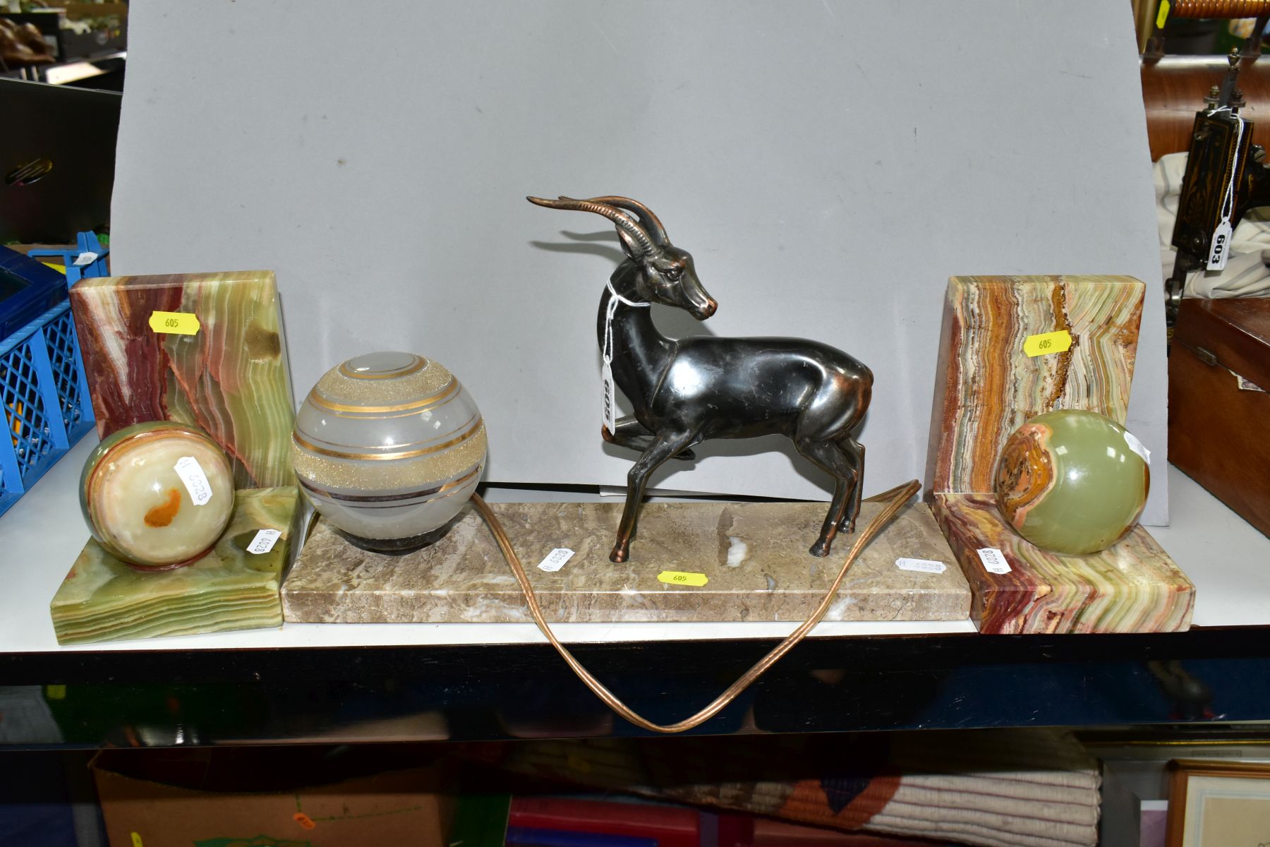 AN ART DECO MARBLE DESK LAMP WITH SPELTER ANTELOPE SCULPTURE, approximate length 35cm, a pair of