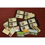 YELLOW PLASTIC CONTAINER WITH THREE ALBUMS of Benham silks fdcs mainly 1980s, also a few loose