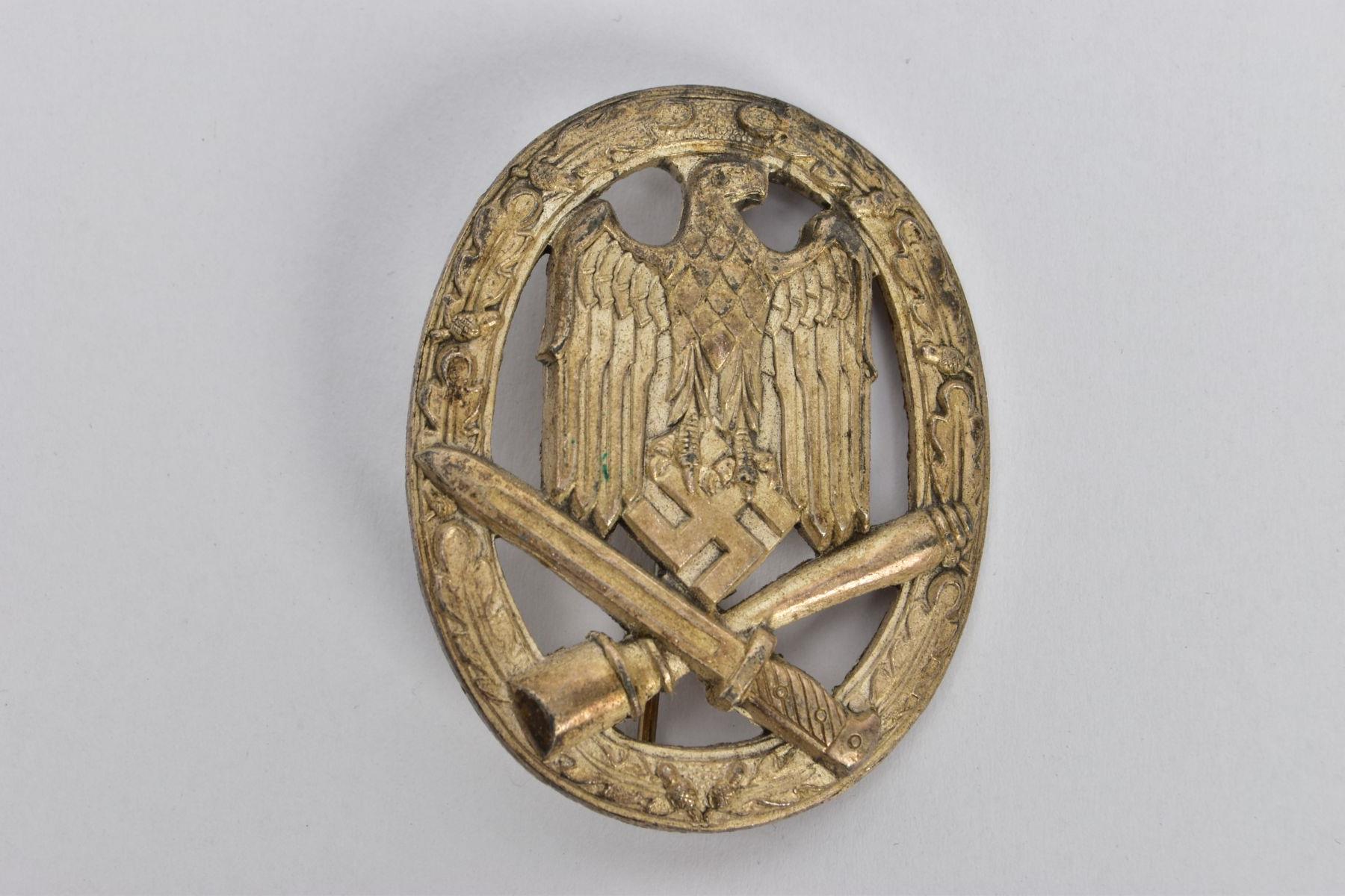 A GERMAN 3RD REICH, WW2 CLOSE COMBAT BADGE SILVER, the needle and hook system shows identical to