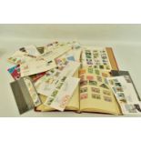 BAG OF STAMPS with a small range of loose GB fdcs, an album of mainly 1930s/40s mint and used with