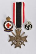 A GERMAN WORLD WAR TWO WAR MERIT CROSS WITH SWORDS, in bronze, the ring suspender is marked with the