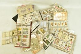 CIGARETTE CARDS, a collection of approximately sixty-five mostly complete sets of Cigarette /