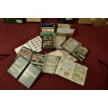 WORLDWIDE COLLECTION OF STAMPS in eight albums and some later GB presentation packs, often empty but