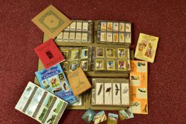 TRADE / CIGARETTE CARDS, three albums containing approximately 75 -80 complete and incomplete sets