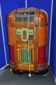 A 1939 ROCK-OLA ST39 JUKEBOX , playing 78s with a valve amplifier, ( PAT pass and working but disc