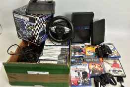 TWO PLAYSTATION 2 CONSOLES, OVER 40 GAMES, AND ACCESSORIES SPREAD ACROSS TWO BOXES; one