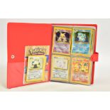 A FOLDER CONTAINING A QUANTITY OF POKEMON CARDS, containing a complete Base Set collection, and