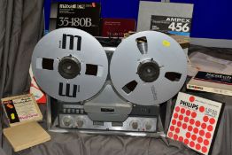 A REVOX G636 REEL TO REEL PLAYER serial No 76067 with 12 spare tape reels, receipt from 1988 for