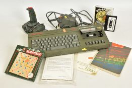 A ZX SPECTRUM + 2 COMPUTER, includes joystick, power supply, Computer Scrabble, Oh Mummy and Coin-Op