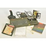 A ZX SPECTRUM + 2 COMPUTER, includes joystick, power supply, Computer Scrabble, Oh Mummy and Coin-Op