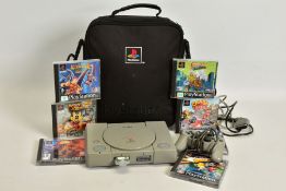 SONY PLAYSTATION WITH A QUANTITY OF GAMES, original Sony Playstation with Crash Bash, Mickey's