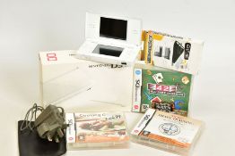 A WHITE DS LITE, complete with box, charger, starter pack, More Brain Training From Doctor Kawashima