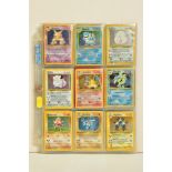 A COMPLETE POKEMON BASE SET, all 102 cards that make up Base Set are present including Machamp 8/102