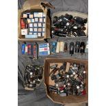 FOUR TRAYS CONTAINING SIXTY FOUR VINTAGE BOXED THERMIONIC VACUUM TUBES (valves) and a quantity of