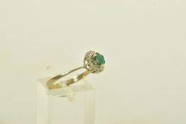 A WHITE METAL CHRYSOPRASE AND DIAMOND CLUSTER RING, designed as a circular cut chrysoprase with