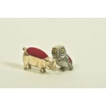 TWO NOVELTY PIN CUSHIONS, the first designed as an owl with paste set eyes, length 30mm, owl stamped