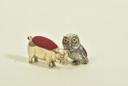 TWO NOVELTY PIN CUSHIONS, the first designed as an owl with paste set eyes, length 30mm, owl stamped