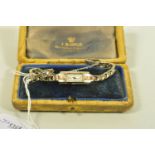 A LADIES GOLD 'ROLEX' WRISTWATCH, rectangular white dial, baton markers, case import hallmark for