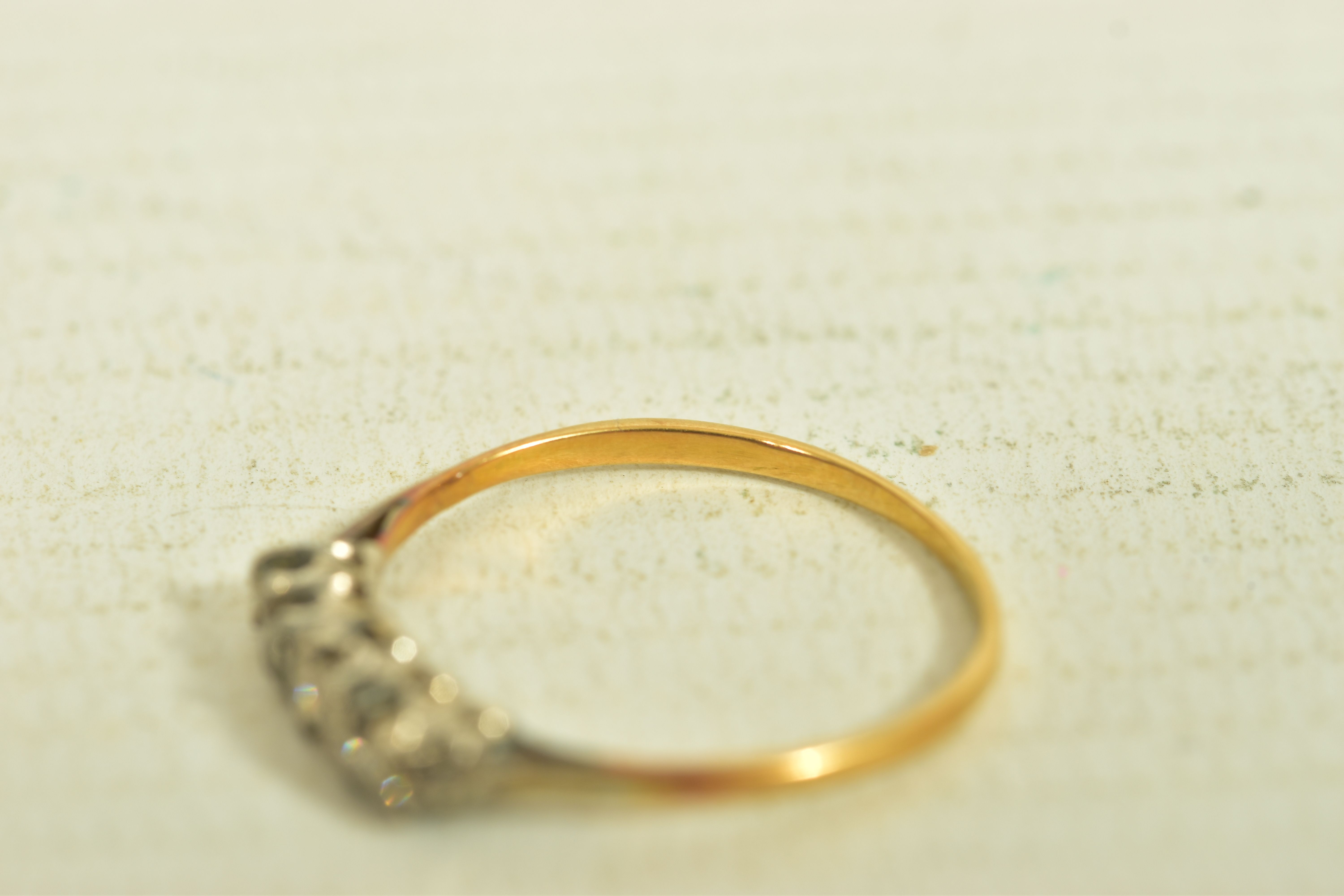 A GOLD DIAMOND FIVE STONE RING, the brilliant cut diamond graduated five stone ring, with openwork - Image 5 of 6
