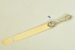 A LATE VICTORIAN IVORY SILVER PAGE TURNER, textured handle and foliate engraving, hallmarked