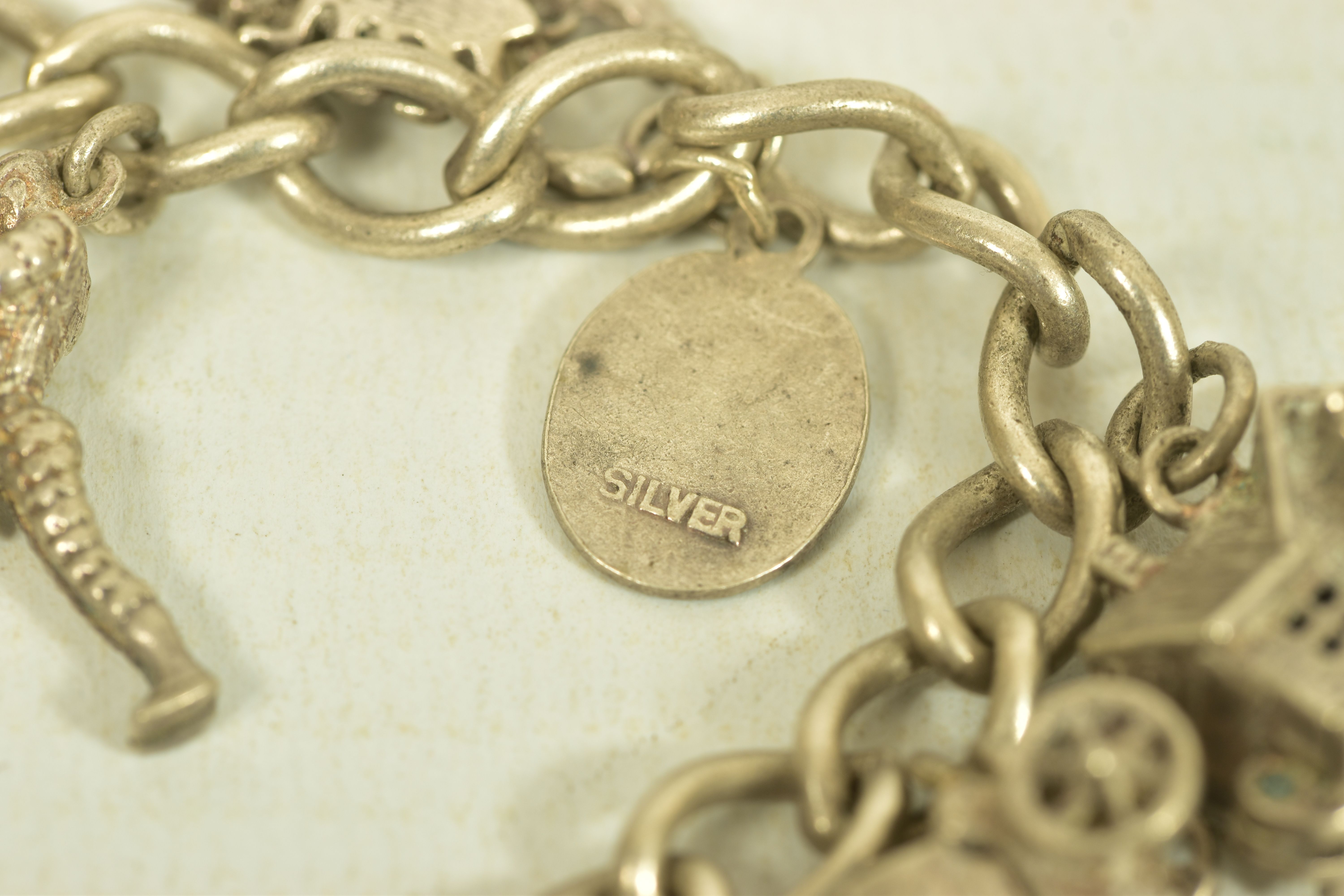 TWO MID 20TH CENTURY SILVER CHARM BRACELETS, the first comprising two cricket and football - Image 6 of 11