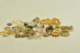 A SELECTION OF COSTUME JEWELLERY, to include two watches, a disc bracelet, two brooches, three