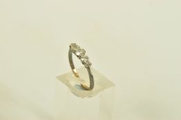 A DIAMOND FIVE STONE RING, set with graduating early brilliant cut diamonds, claw set, to the