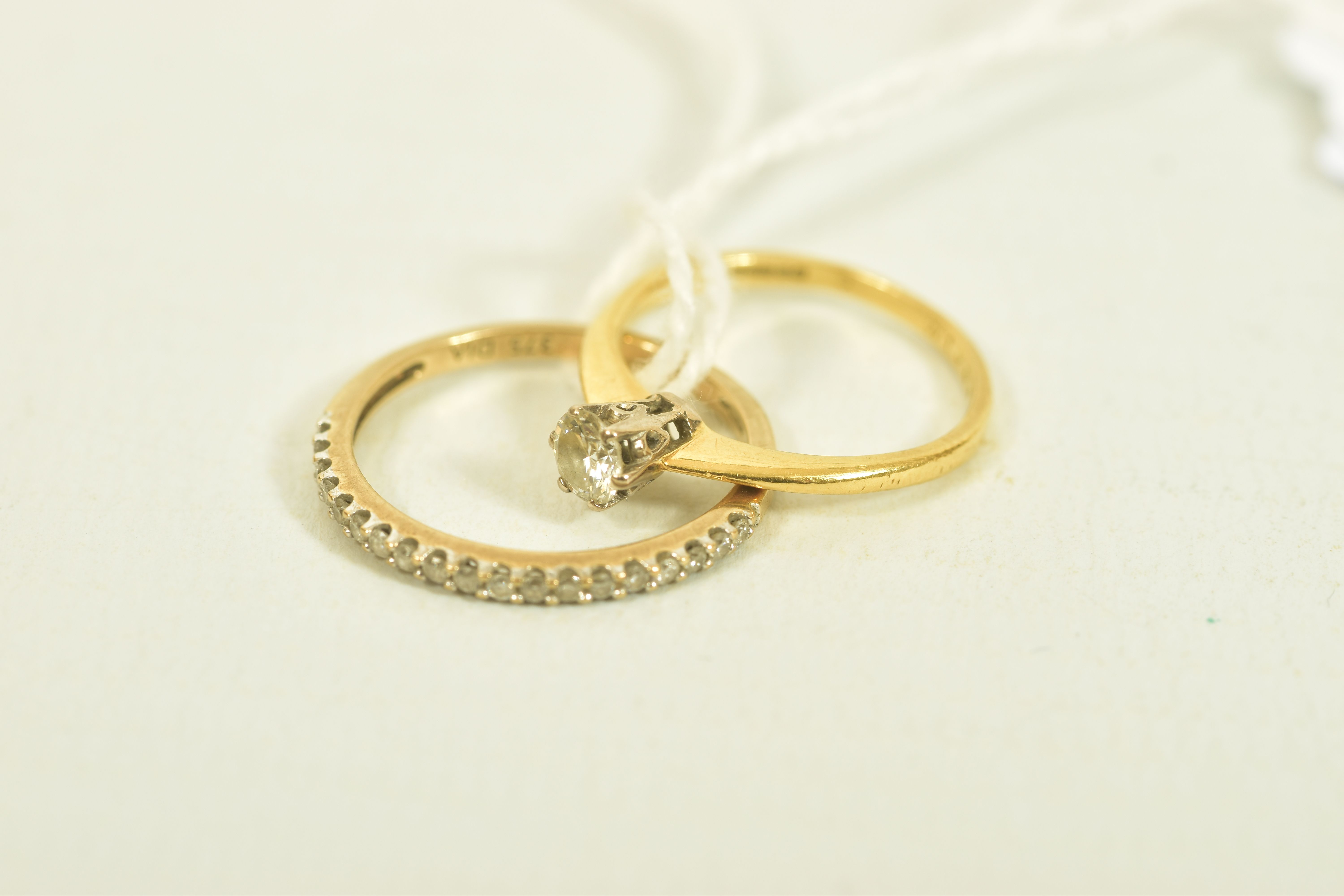 TWO GOLD DIAMOND RINGS, the first an 18ct gold brilliant cut diamond single stone ring, estimated