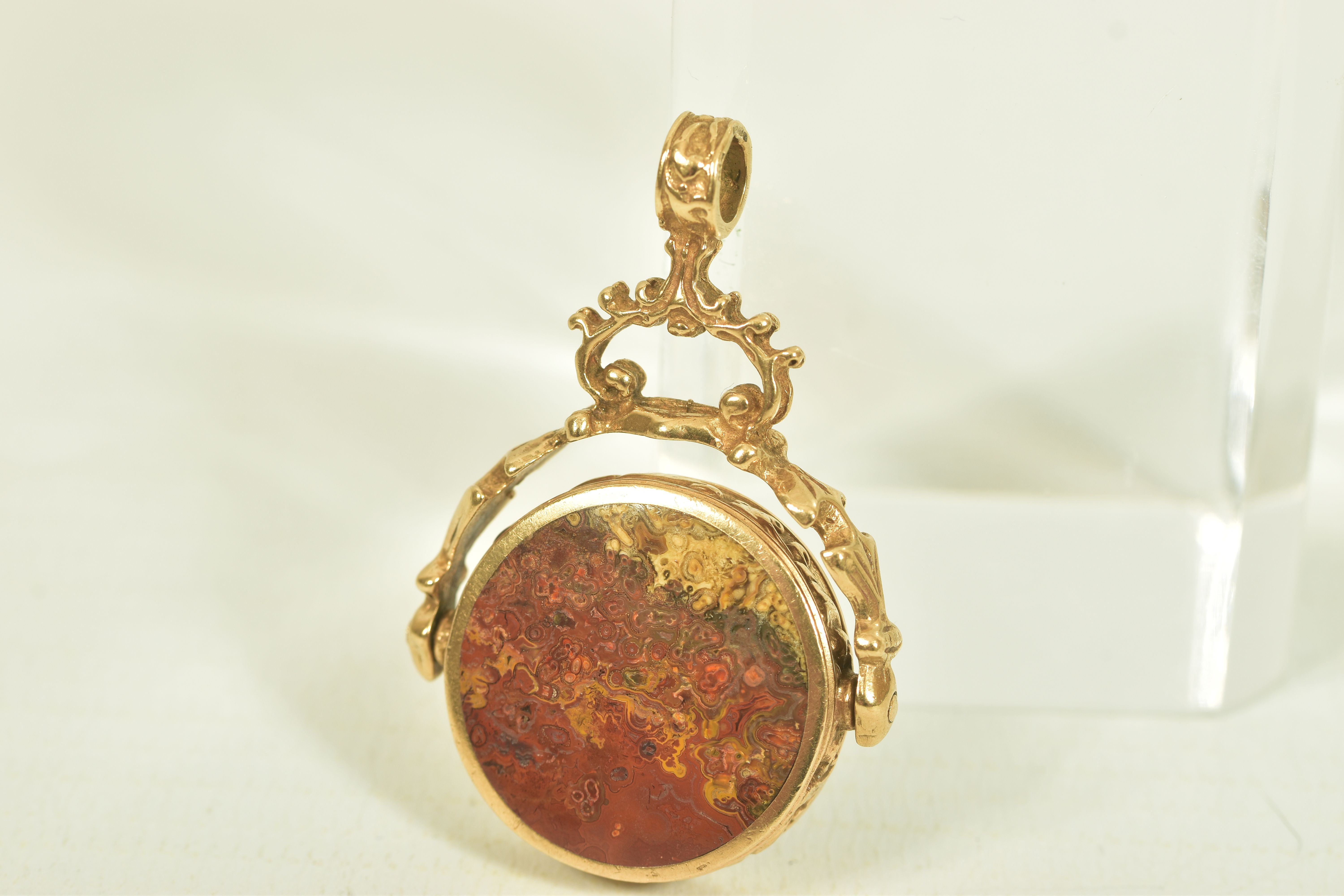 A 9CT GOLD CARNELIAN AND AGATE SWIVEL FOB, the circular carnelian and agate panels, within a - Image 2 of 6