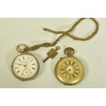 TWO POCKET WATCHES, the first a late Victorian silver open face pocket watch with key, circular