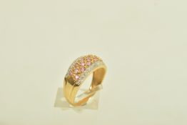 A 14CT GOLD SYNTHETIC PINK SAPPHIRE AND DIAMOND DRESS RING, comprising synthetic pink sapphire