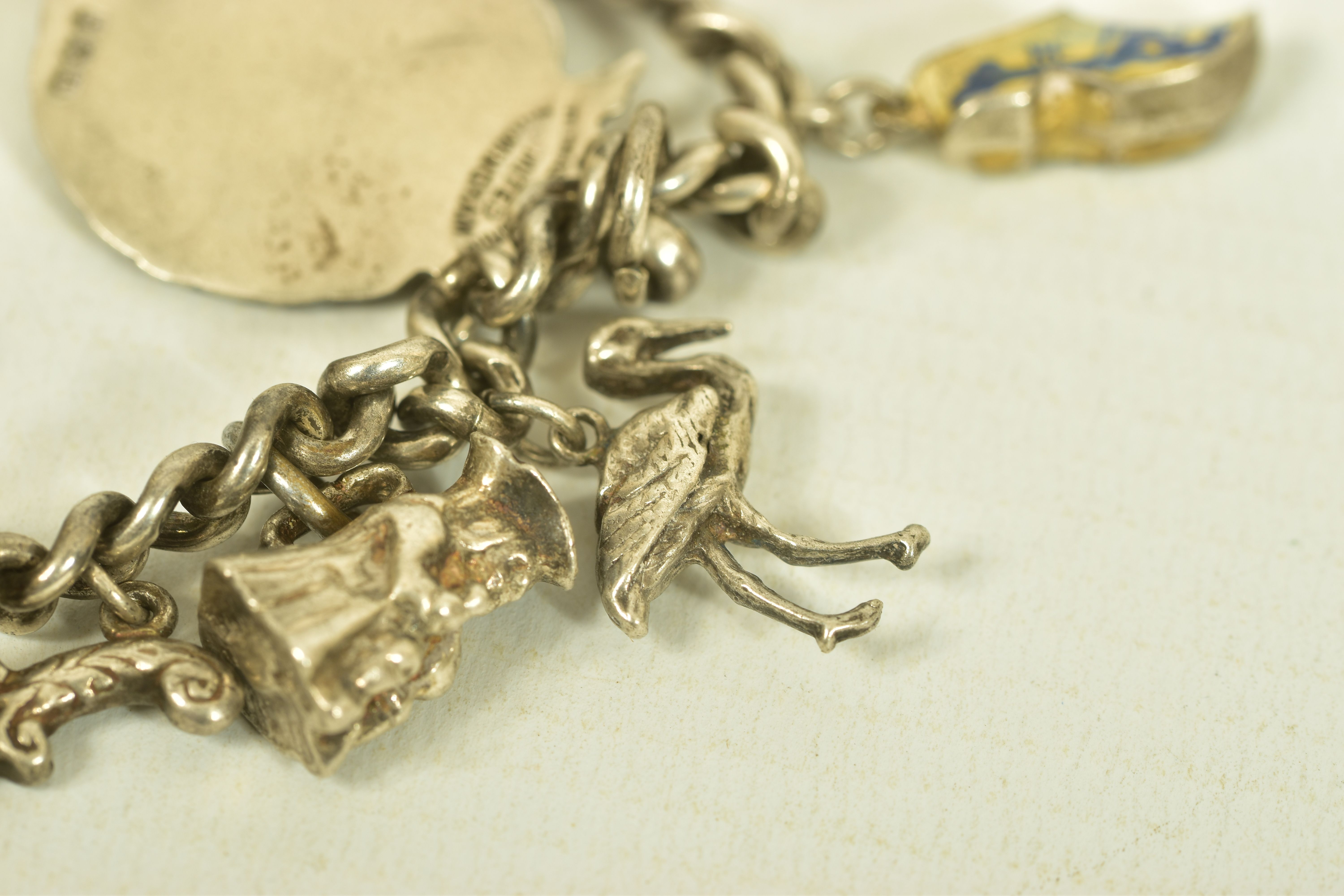 TWO MID 20TH CENTURY SILVER CHARM BRACELETS, the first comprising two cricket and football - Image 10 of 11