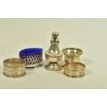 A SELECTION OF SILVER ITEMS, to include three early 20th century napkin rings, hallmarked London