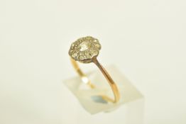 A YELLOW METAL OLD CUT DIAMOND CLUSTER RING, the old cut diamond with similar cut diamond