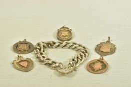FIVE EARLY 20TH CENTURY SILVER MEDALLIONS, AND A LATER SILVER CURB LINK CHAIN BRACELET, the
