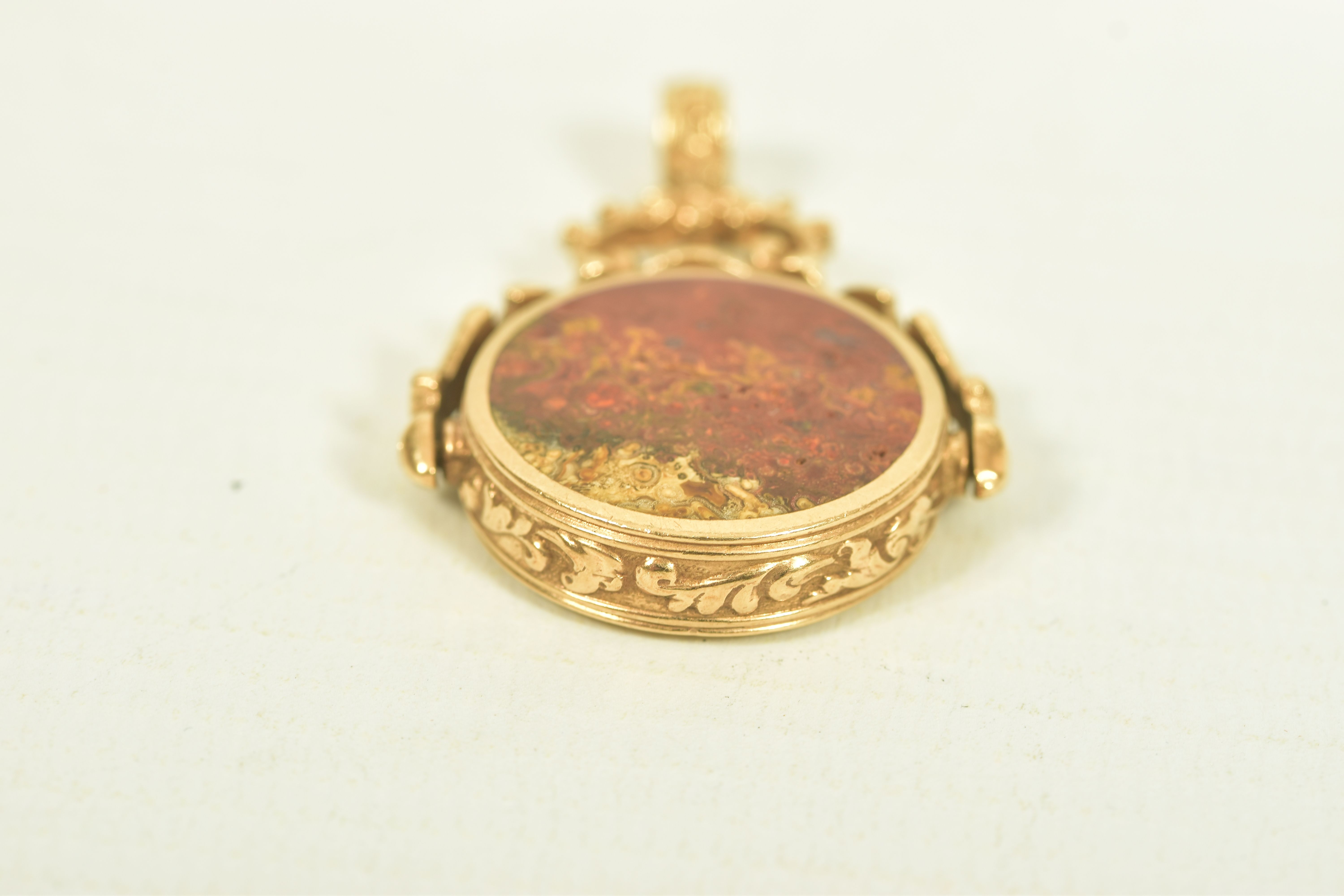 A 9CT GOLD CARNELIAN AND AGATE SWIVEL FOB, the circular carnelian and agate panels, within a - Image 6 of 6
