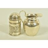 A LATE VICTORIAN PEPPER POT AND AN EDWARDIAN SILVER JUG, the first a late Victorian engraved