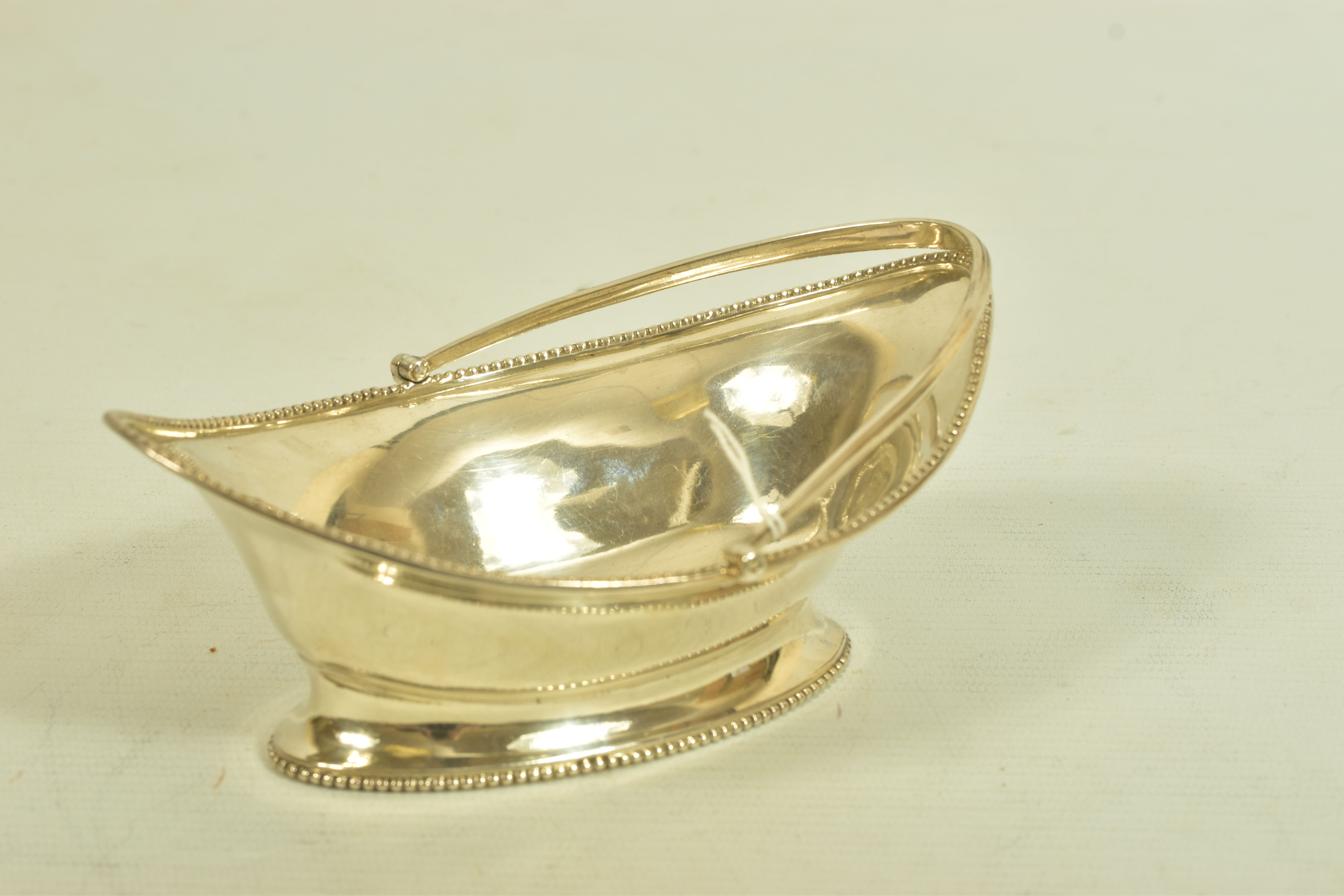 A GEORGIAN SILVER BASKET, of oval outline with plain polished beaded border and grooved handle, - Image 4 of 4