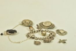 A SELECTION OF SILVER AND WHITE METAL JEWELLERY, to include a Victorian silver memorial floral