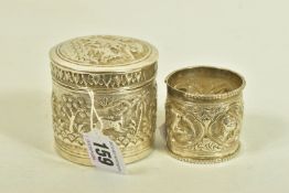 TWO EARLY 20TH CENTURY ITEMS, the first an embossed unmarked white metal pot depicting a hunting