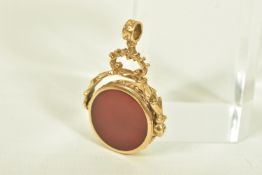 A 9CT GOLD CARNELIAN AND AGATE SWIVEL FOB, the circular carnelian and agate panels, within a